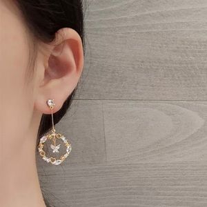 Floating Butterfly Dangling Wreath Gold Earrings